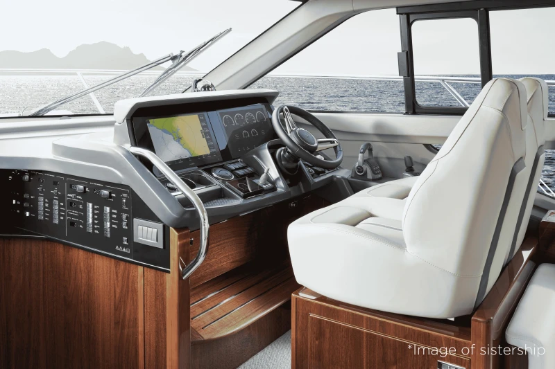 Luxurious 2026 Princess F50 yacht cockpit with advanced navigation system and plush seating.