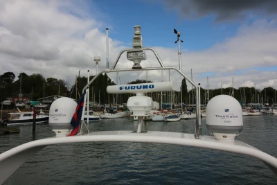 Rear view of a 2004 Princess 61 yacht in harbor.