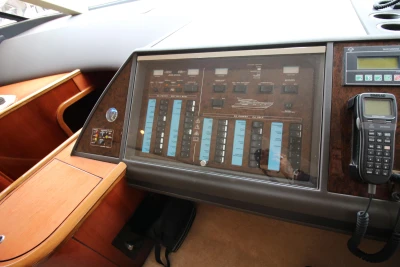 Control panel of a 2004 Princess 61 yacht with communication device.