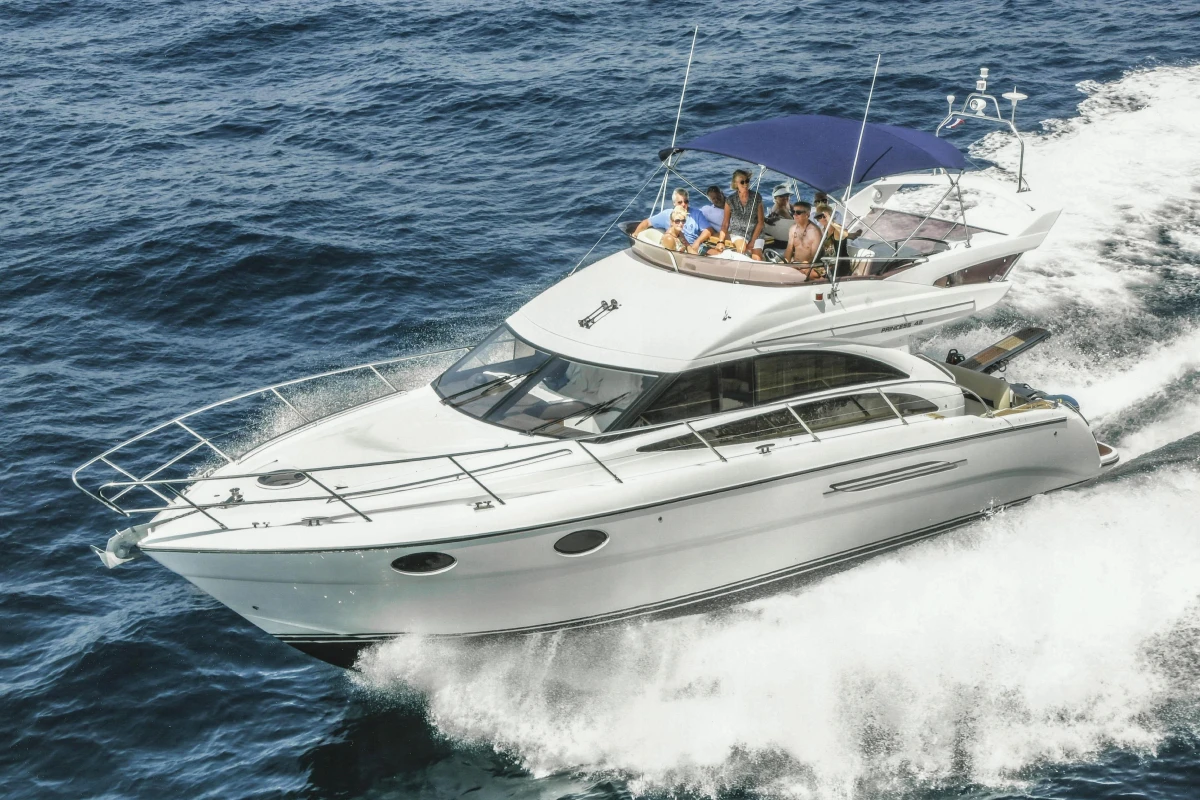 Luxury Princess 42 yacht cruising on open sea, 2013 model.
