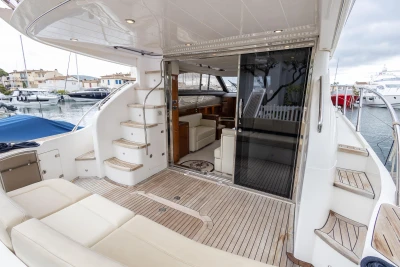 Luxurious 2013 Princess 42 yacht with spacious deck and elegant interior.