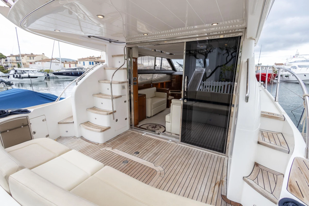 Luxurious 2013 Princess 42 yacht with spacious deck and elegant interior.