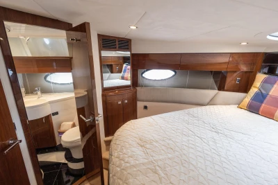 Luxurious cabin interior of 2013 Princess 42 yacht with ensuite bathroom.
