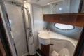 Luxurious bathroom in 2013 Princess 42 yacht with modern fixtures and elegant design.