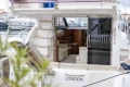 Luxury yacht Princess 42, 2013 model, docked with open cabin view, London registration.