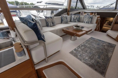 Luxurious interior of 2020 Princess F55 yacht with elegant seating and decor.