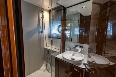 Luxurious bathroom in 2023 Princess V50 yacht with modern fixtures and elegant design.