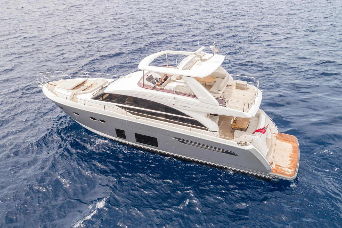 Luxurious 2015 Princess 68 yacht cruising on open sea.