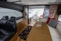 Luxurious interior of 2014 Princess V48 yacht with elegant seating and ocean view.