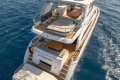 Luxury 2017 Princess 68 yacht on open water, featuring spacious deck and seating areas.