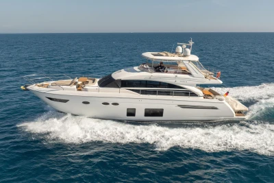 Luxury 2017 Princess 68 yacht cruising on open sea.