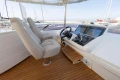 Helm of 2017 Princess 68 yacht with dual seats and modern controls.