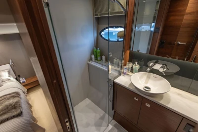 Luxurious bathroom in 2017 Princess 52 yacht with modern fixtures and elegant design.