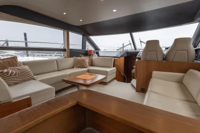 Luxurious interior of 2017 Princess 52 yacht with elegant seating and modern design.
