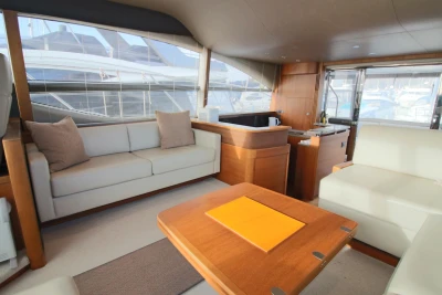 Luxurious interior of 2017 Princess 52 yacht with elegant seating and modern design.