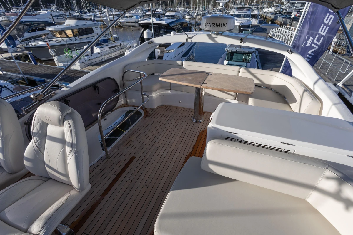 Luxurious deck of Princess F50 yacht, 2025 model, docked at marina.