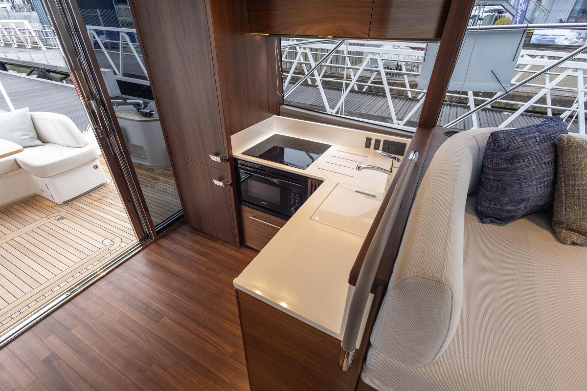 Interior of Princess F50 yacht, modern kitchen and seating area.