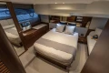 Luxurious bedroom on the 2025 Princess F50 yacht.