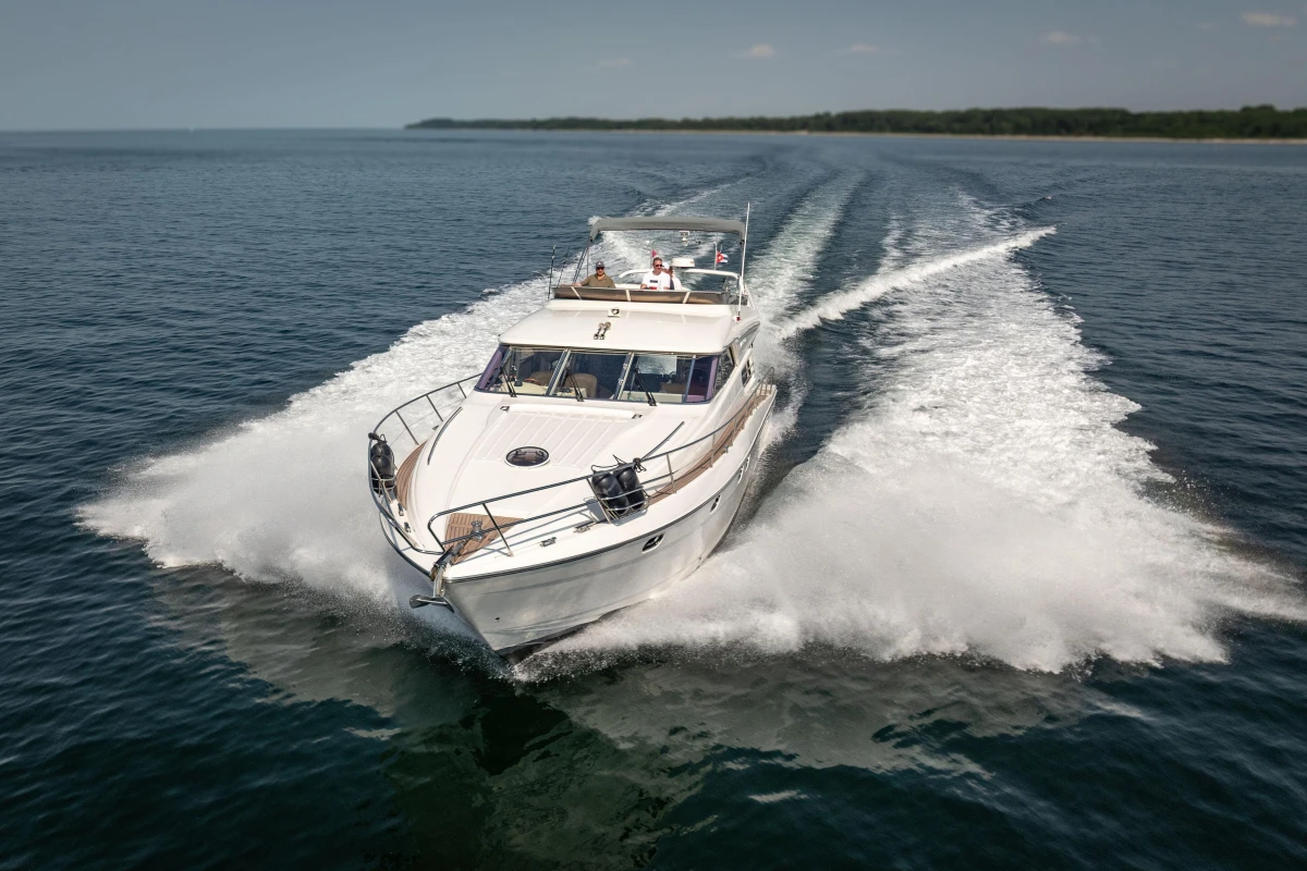 Luxury Princess 60 yacht cruising on open water, 1995 model.