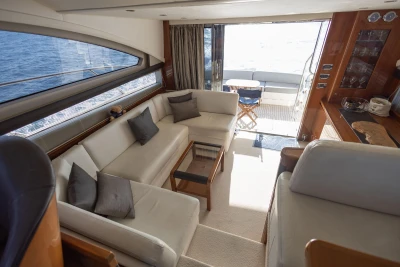 Luxurious interior of a 2012 Princess 50 yacht with elegant seating and ocean view.