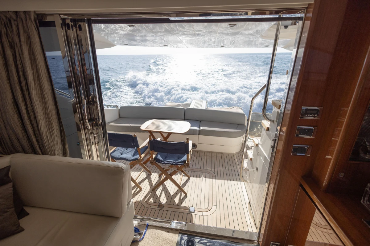 Luxurious 2012 Princess 50 yacht interior with ocean view and elegant seating area.