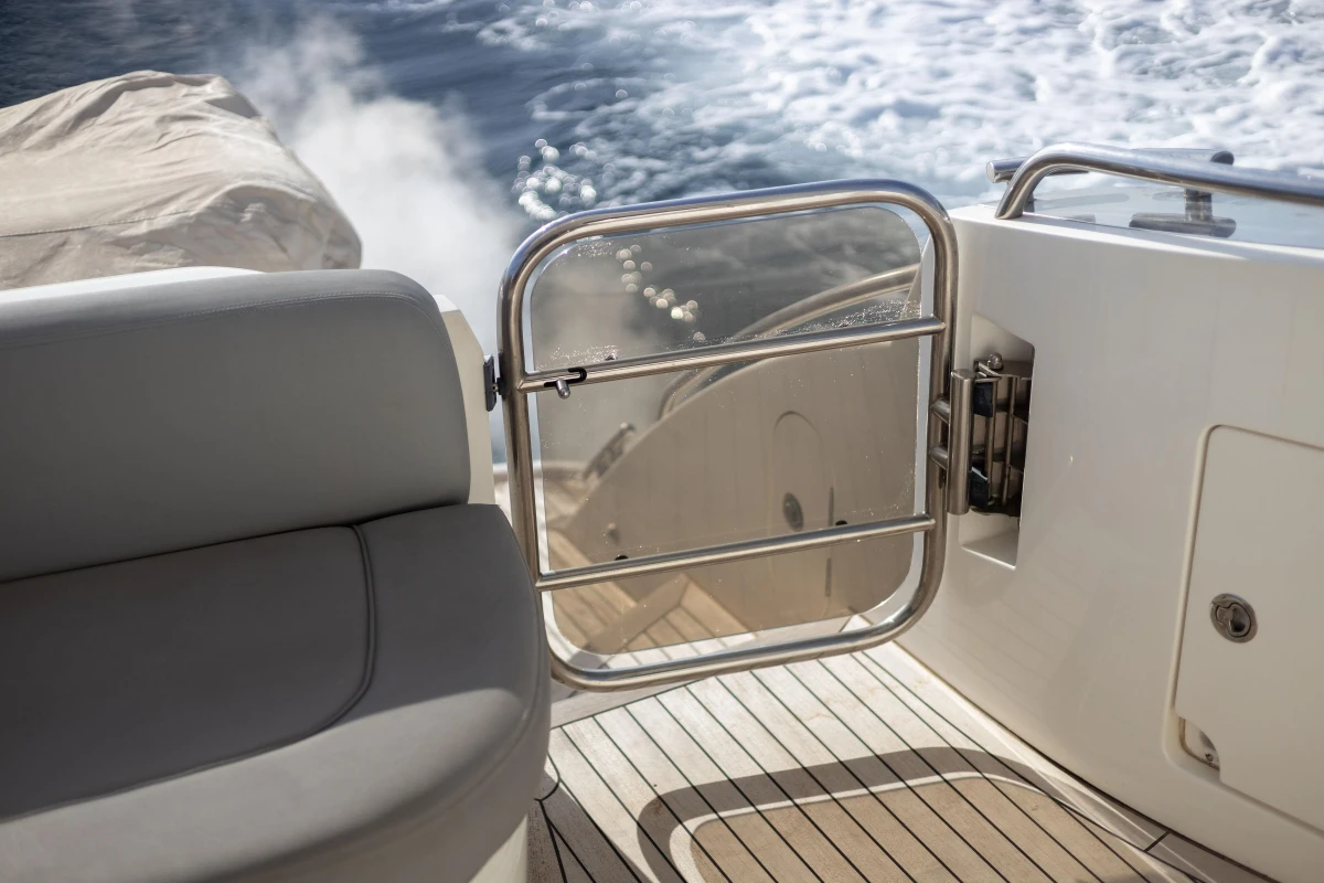 Luxury yacht Princess 50, 2012 model, featuring sleek deck design and ocean view.