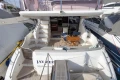 Luxury Princess 50 yacht, 2012 model, featuring spacious deck and elegant seating area.