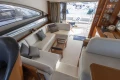 Luxurious interior of 2012 Princess 50 yacht with elegant seating and modern design.