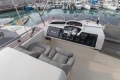 Helm of 2012 Princess 50 yacht with modern controls and comfortable seating.