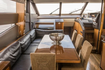 Luxurious interior of 2013 Princess 72 Motor Yacht with elegant dining area.