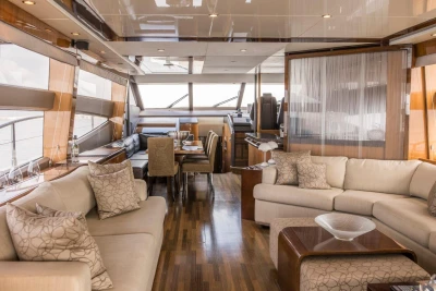 Luxurious interior of 2013 Princess 72 Motor Yacht with elegant seating and dining area.