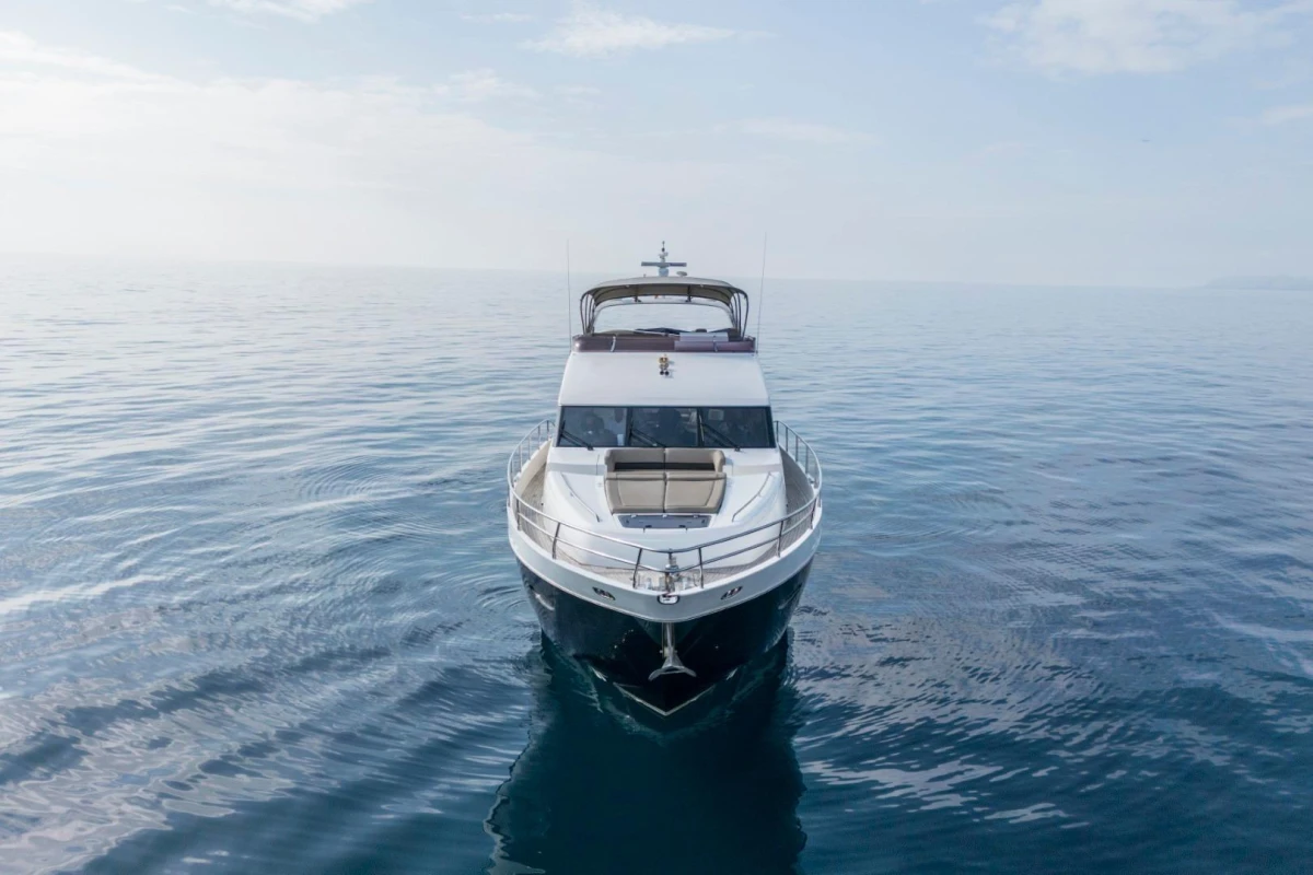2013 Princess 72 Motor Yacht on calm ocean waters, front view.