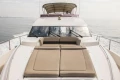 2013 Princess 72 Motor Yacht cruising with sunbathing deck, ocean view.