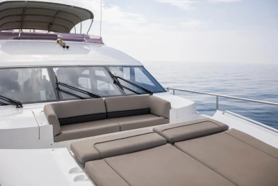 2013 Princess 72 Motor Yacht with spacious deck seating on calm sea.
