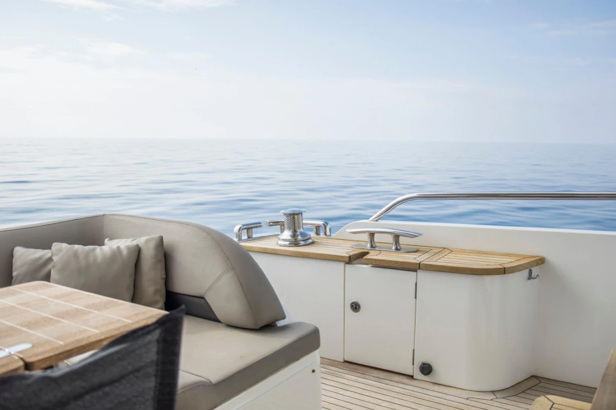Luxurious 2013 Princess 72 Motor Yacht deck with ocean view and seating area.