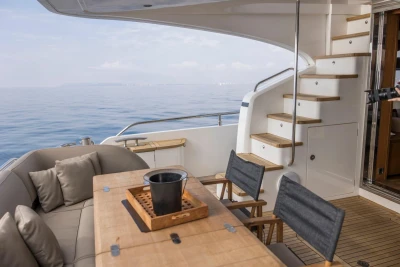 Luxurious 2013 Princess 72 Motor Yacht deck with seating and ocean view.