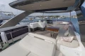 Luxurious 2020 Princess F62 yacht deck with elegant seating and ocean view.