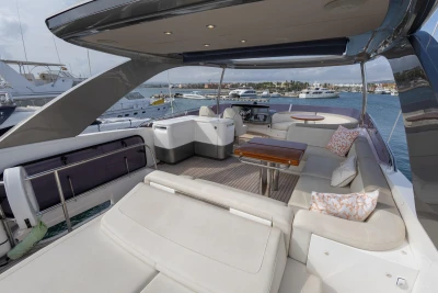 Luxurious 2020 Princess F62 yacht deck with elegant seating and ocean view.