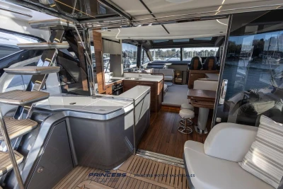 Luxurious interior of 2026 Princess S65 yacht with modern design and elegant furnishings.