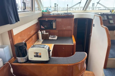 Luxurious galley in 2004 Princess 45 Flybridge Motor Yacht with modern appliances.