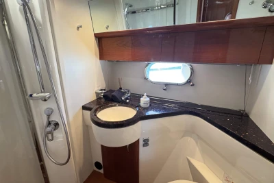 Luxurious bathroom in 2006 Princess 42 yacht with modern fixtures and elegant design.