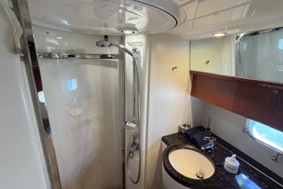 Luxurious bathroom in 2006 Princess 42 yacht with modern fixtures and elegant design.