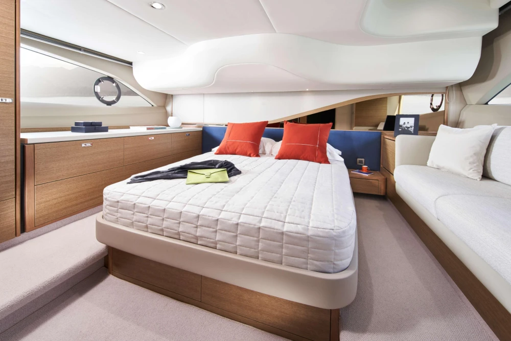 Luxurious interior of 2023 Princess F45 yacht with modern bedroom design.