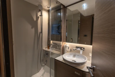 Luxurious bathroom in 2023 Princess V50 Open yacht, featuring modern fixtures and elegant design.