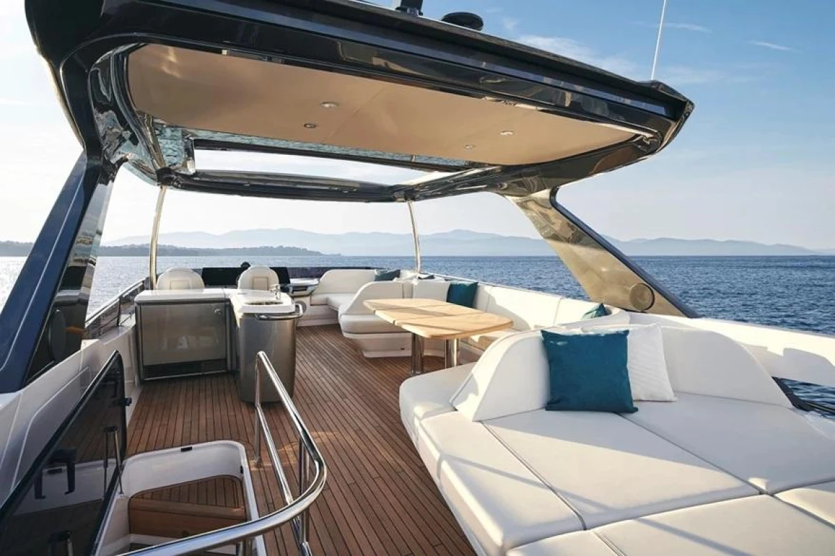 Luxurious 2025 Princess F65 yacht deck with elegant seating and ocean view.