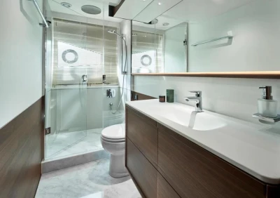 Luxurious bathroom in 2025 Princess F65 yacht, featuring modern fixtures and elegant design.
