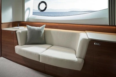 Luxurious interior of 2025 Princess F65 yacht with elegant seating and ocean view.