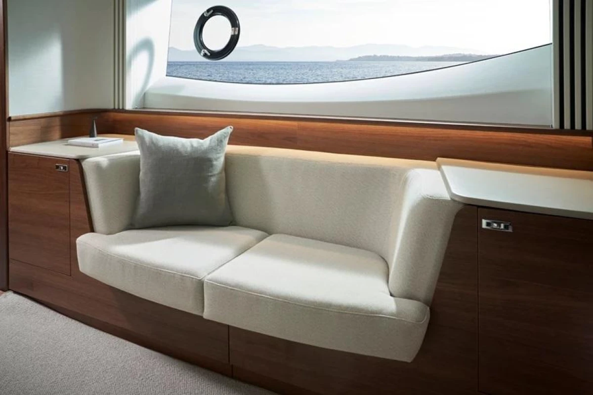 Luxurious interior of 2025 Princess F65 yacht with elegant seating and ocean view.