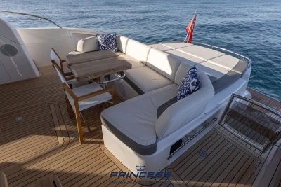 Luxurious 2019 Princess S60 yacht deck with elegant seating and ocean view.