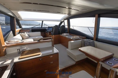 Luxurious interior of 2019 Princess S60 yacht with elegant seating and ocean view.